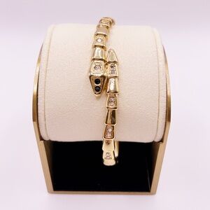 Luxurious Gold Snake Bracelet with Crystal Accents